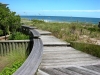 Newcastle_Pawleys Island_beach boardwalk with benches_native grasses and wood steps