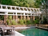 paris mountain_greenville_south carolina_pool with arbor and stone retaining wall_native grasses