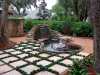 Shedlarz_custom water feature with tabby and mondo grass green grid.jpg